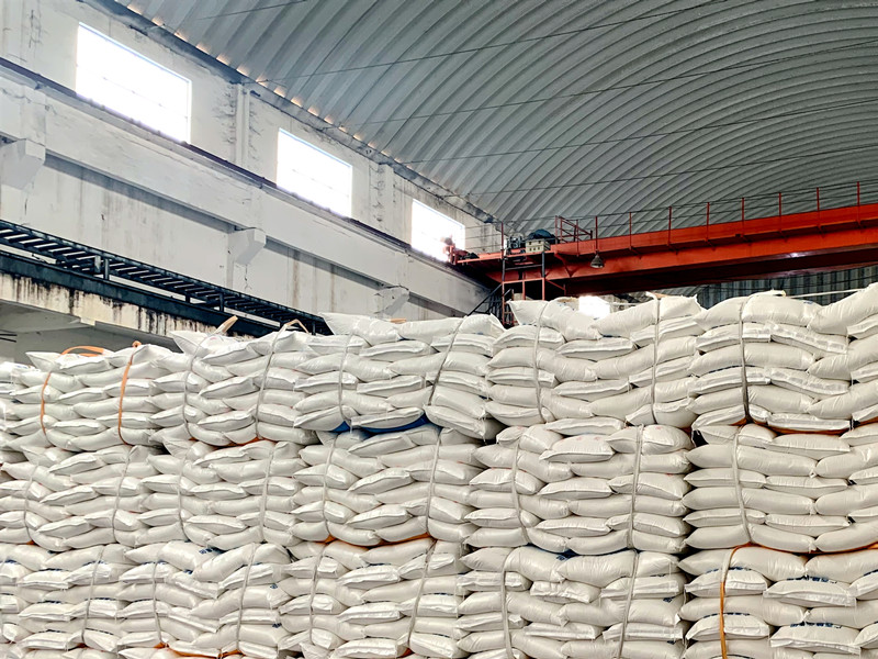 /QJ_195213696045.jpg 堆滿食糖的倉(cāng)庫(kù).jpg